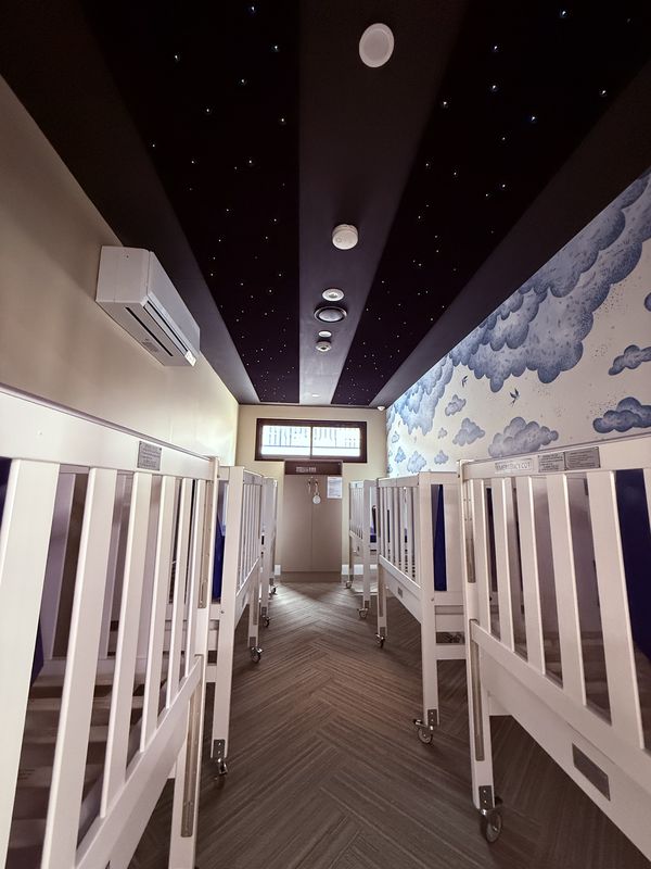 Childcare sleep room with star ceiling lighting, split system and ceiling services