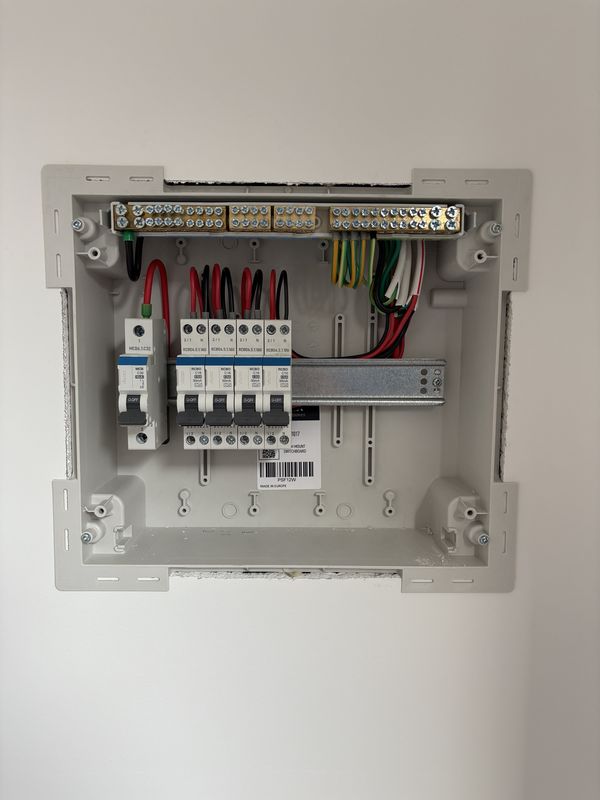 Flush mounted switchboard with a main switch and individual RCBOs on each circuit