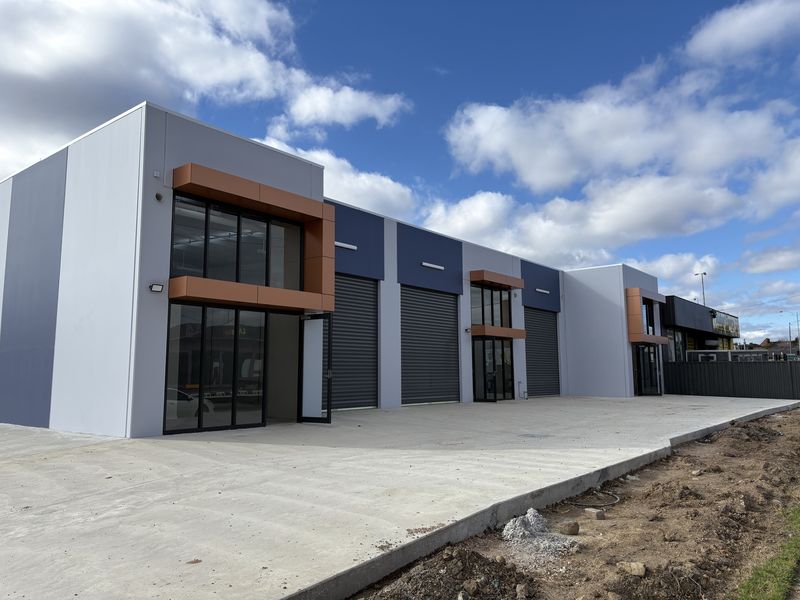 New development of a retail showroom and factory units with external flood lighting